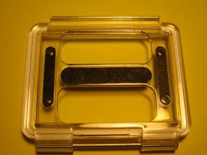 Open backing plat for GoPro Waterproof case to allow better sound recording